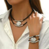 2e50da91-174b-490b-9aac-6943f7140143.jpg Womens Retro-Style Silver Oval Pendant Necklace And Bracelet Set