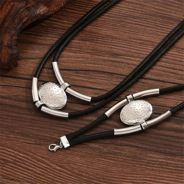 4bc3ebf0-959e-4fe9-9fca-8dc78d67d159.jpg Womens Retro-Style Silver Oval Pendant Necklace And Bracelet Set
