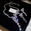 53de0d1d-0456-4eba-86fc-06915079f7eb.jpg Silver Needle Zircon Butterfly Tassel Earrings And Necklace Set
