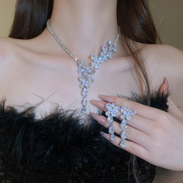 65ec76a5-19eb-4e69-9392-806402fdbcf9.jpg Silver Needle Zircon Butterfly Tassel Earrings And Necklace Set