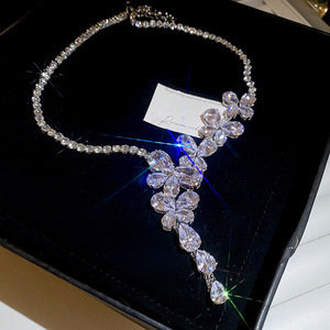 8fe0e83c-04f3-4116-a531-6111670902f4.jpg Silver Needle Zircon Butterfly Tassel Earrings And Necklace Set