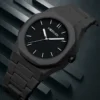 Montre à quartz pour homme, style minimaliste noir, aiguilles octogonales, à clous.