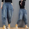 S1718c1fec7b64a86814b6b1689a5df23W.webp Pantalon harem en jean oversize pour femme, taille élastique, jambes larges, délavé, coupe ample, style rétro streetwear