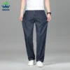 Jean ample droit d'été pour homme de haute qualité, pantalon en denim taille haute, style business casual, en lyocell, idéal pour le travail au bureau.