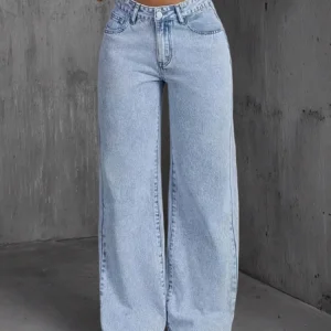 S2b073d51c5a5403eb88557c65dcb201ab.webp Jeans pour femme style années 2000, pantalon en denim bleu clair à jambes larges, coupe ample, mode simple et extensible, idéal en toutes saisons et décontracté.