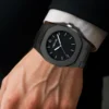 Montre à quartz pour homme, style minimaliste noir, aiguilles octogonales, à clous.