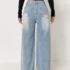 S30a6da7008314c04b9cdc9a46766348dt.webp Jeans pour femme style années 2000, pantalon en denim bleu clair à jambes larges, coupe ample, mode simple et extensible, idéal en toutes saisons et décontracté.