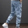 Jeans cargo noir et bleu printemps été homme streetwear pantalon de jogging en denim pantalon harem ample grande taille