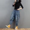 S3f3b060391a7406e99897b44aaa198ebO.webp Pantalon harem en jean oversize pour femme, taille élastique, jambes larges, délavé, coupe ample, style rétro streetwear