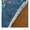 Jeans ethniques pour femmes, collection printemps-automne 2026. Pantalon ample à taille haute, brodé et jambes larges 9/4.