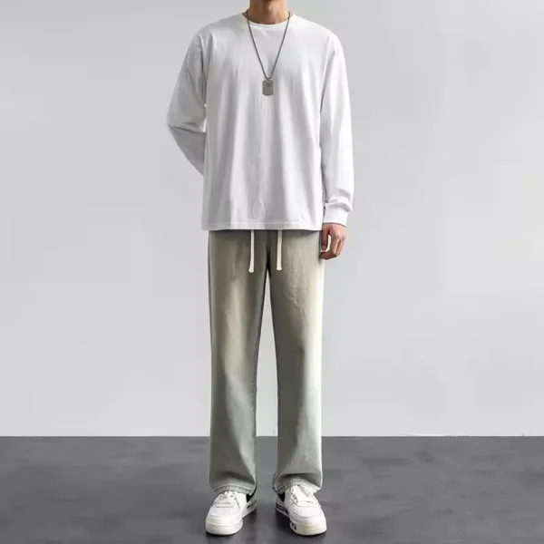 Jeans longs décontractés pour homme, coupe classique, jambes larges.
