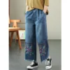 Jeans ethniques pour femmes, collection printemps-automne 2026. Pantalon ample à taille haute, brodé et jambes larges 9/4.