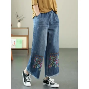 Jeans ethniques pour femmes, collection printemps-automne 2026. Pantalon ample à taille haute, brodé et jambes larges 9/4.