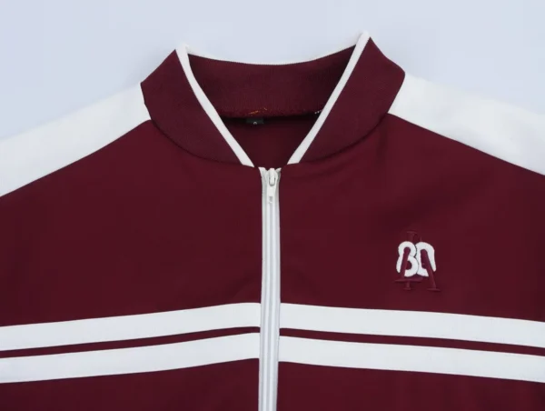 Ensemble veste vintage automne pour femme, col rond, fermeture éclair, pantalon taille élastique, collection printemps-automne 2025, style streetwear décontracté.