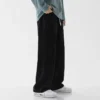Jeans longs décontractés pour homme, coupe classique, jambes larges.