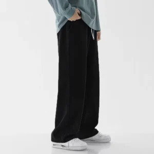 Jeans longs décontractés pour homme, coupe classique, jambes larges.