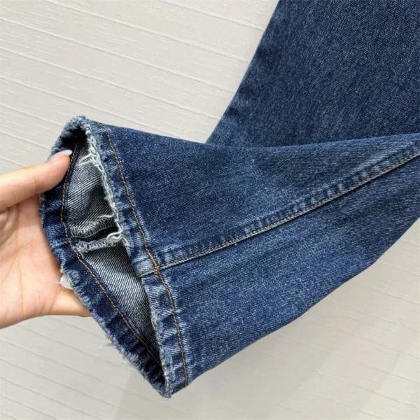 S92bb6f41fa6a4176ac442aacb1f3a887K.webp Jean femme nouveau modèle taille haute coupe slim pour l’été 2026, pantalon coupe droite en coton pur avec effet délavé rétro style Y2K
