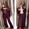 Ensemble veste vintage automne pour femme, col rond, fermeture éclair, pantalon taille élastique, collection printemps-automne 2025, style streetwear décontracté.