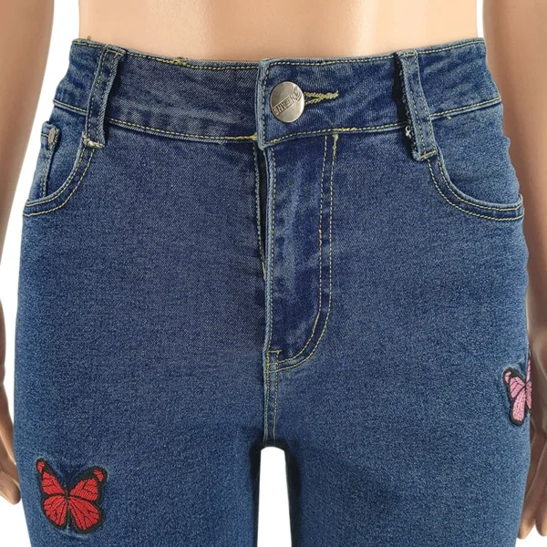 Jean Benuynffy rétro à broderie papillon et ourlet à franges, style streetwear femme, coupe ample, taille haute, droit, jambes larges.