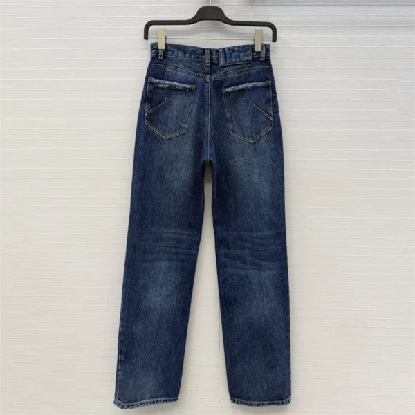 Sc38d3a3de42f48fdac7f6e054e318e0fK.webp Jean femme nouveau modèle taille haute coupe slim pour l’été 2026, pantalon coupe droite en coton pur avec effet délavé rétro style Y2K