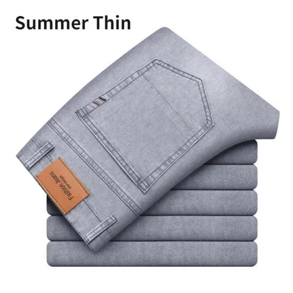 Jean homme, coupe droite, en coton stretch, gris clair, taille haute, style business décontracté.