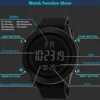 Montre numérique unisexe à grand cadran, éclairage LED, étanche, bracelet en caoutchouc, alarme, noire.
