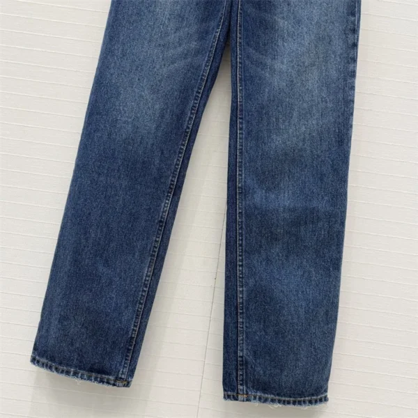 Sd68463f93541494087e4d0224f502428E.webp Jean femme nouveau modèle taille haute coupe slim pour l’été 2026, pantalon coupe droite en coton pur avec effet délavé rétro style Y2K