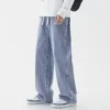 Jeans longs décontractés pour homme, coupe classique, jambes larges.