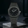 Montre à quartz pour homme, style minimaliste noir, aiguilles octogonales, à clous.