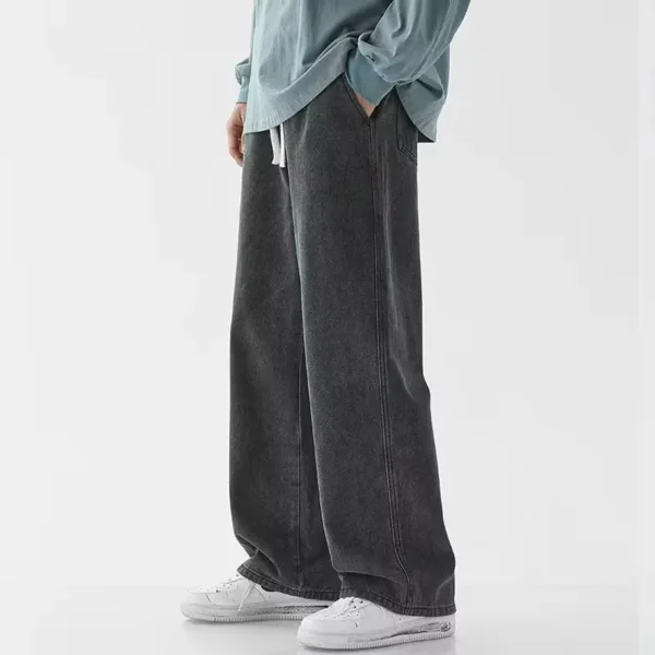 Jeans longs décontractés pour homme, coupe classique, jambes larges.