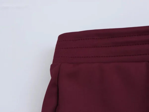 Ensemble veste vintage automne pour femme, col rond, fermeture éclair, pantalon taille élastique, collection printemps-automne 2025, style streetwear décontracté.