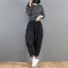 Sf3f894f81ddd4e76860e2a79cd9487f1P.webp Pantalon harem en jean oversize pour femme, taille élastique, jambes larges, délavé, coupe ample, style rétro streetwear