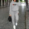 Vêtements femme automne-hiver : sweats à capuche, pantalons, ensembles streetwear de haute qualité et de luxe pour femmes.