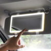 Miroir de courtoisie pour pare-soleil automobile avec éclairage et variateur d'intensité