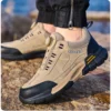 Chaussures de sécurité pour hommes avec embout en acier, semelles anti-écrasement, anti-perforation et antidérapantes ; chaussures de travail industrielles tendance à fermeture par bouton.