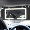 Miroir de courtoisie pour pare-soleil automobile avec éclairage et variateur d'intensité